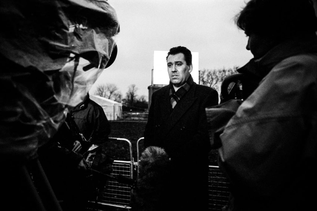 Following a massive demonstration in central London, which saw 20,000 firefighters and trade unionists from around the UK march through the streets of the capital demanding fairer pay for British firefighters, Fire Brigades Union (FBU) General Secretary, Andy Gilchrist, speaks to a news television crew in Hyde Park about the events of the day. Image copyright © Thaddeus Pope, 2002.