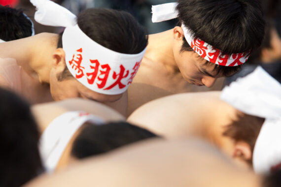 Final prayers are made before the men enter the sea.