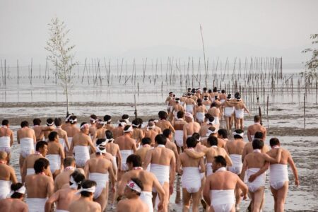 In accordance with the Shinto practice of ritual purification known as misogi, the shin-otoko (holy men) and the two teams of local men cleanse themselves of their sins and impurities by washing in the sea.