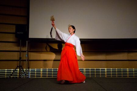 A member of the Akutagawa High School Taiko Club gives a traditional dance performance at the Osaka International Convention Centre in Osaka, Japan.