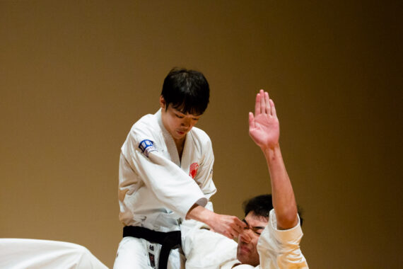 A successful takedown during a karate demonstration in Kobe, Japan.