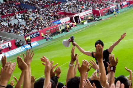 Fans of Vissel Kobe cheer on their team as they play against Cerezo Osaka in a league-cup Kansai derby. Cerezo Osaka defeated Vissel Kobe 1-0.