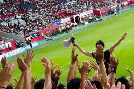 Fans of Vissel Kobe cheer on their team as they play against Cerezo Osaka in a league-cup Kansai derby. Cerezo Osaka defeated Vissel Kobe 1-0.