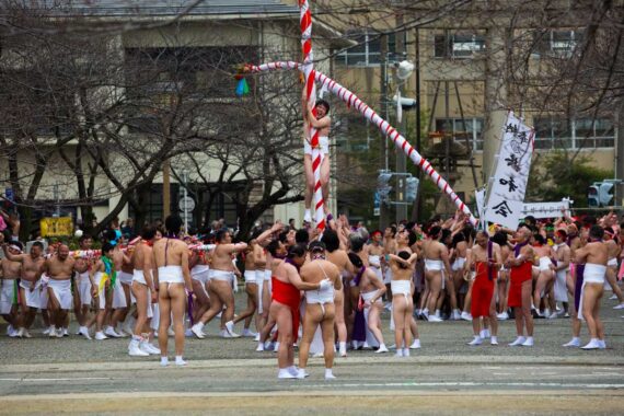Men attempt to climb the 'naoi-zasa' during the Konomiya Hadaka Matsuri (Konomiya Naked Man Festival) in Inazawa, Aichi Prefecture, Japan. From the series "Konomiya Hadaka Matsuri".